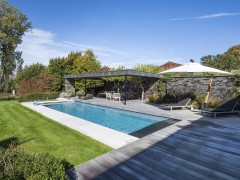 DCPools bvba Se retrouver chez soi dans un jardin avec piscine